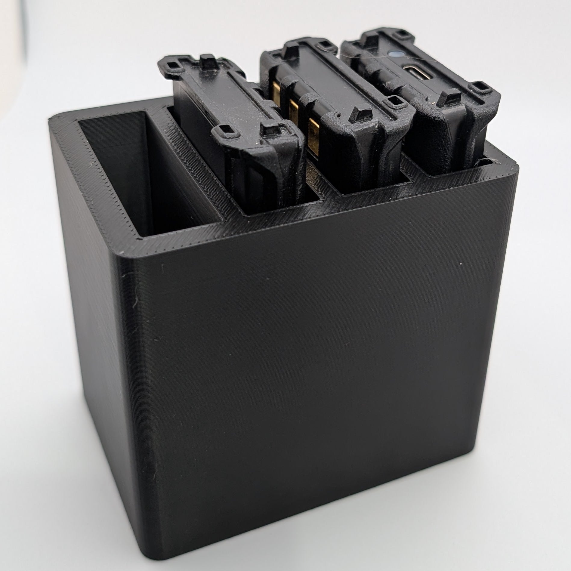UV5R Batteries in a plastic organizer